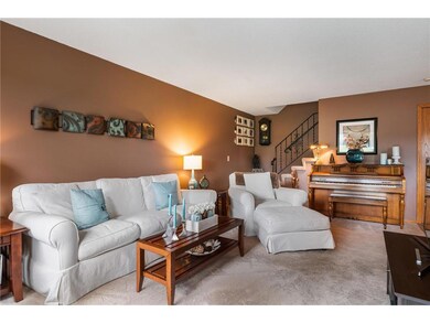 Inviting living room as you enter your new town ho
