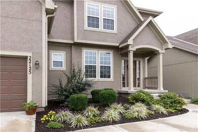 Lush landscaping and in ground sprinkler system in
