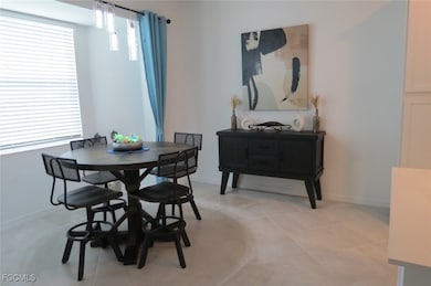 Dining space featuring baseboards