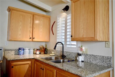 Beautiful granite counters and brushed bronze finishes throughout the home!