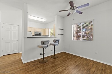 Kitchen featuring stainless steel microwave, a kit
