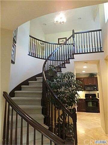 Staircase off formal foyer