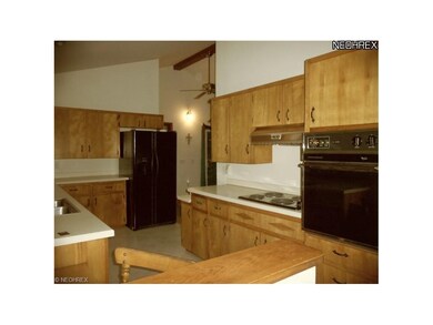 Kitchen offers all appliances and plenty of cupboa