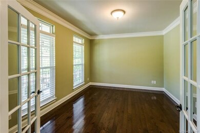 Off the foyer, the main level office/study/living 
