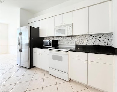 8731 Naples Heritage Dr unit D30, Naples, FL 34112 - photo 7