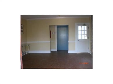 Foyer. Foyer - view from front doors facing elevat