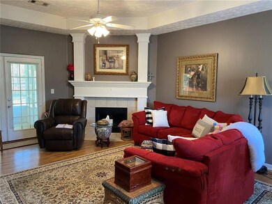 Living room area with French doors to screened por