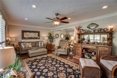 Living room flows into dining area and kitchen