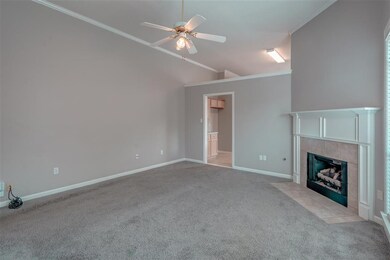 Featuring vented tile fireplace with gas logs and 