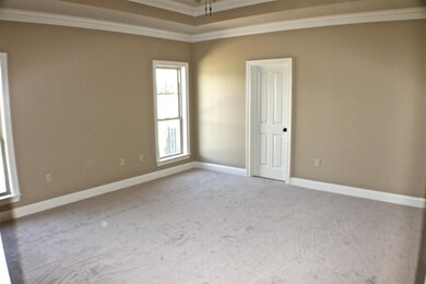The Master bedroom is nicely sized and included en