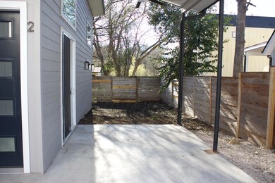 View of patio with a fenced backyard