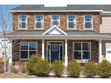 Elegant stone front exterior with full-length invi