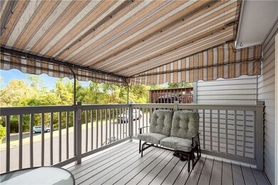 Covered deck for relaxing and added outdoor space.