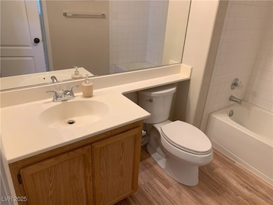 Full bathroom featuring vanity, toilet, shower / b