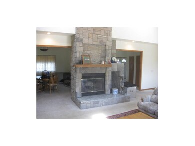 Stone fireplace with gas starter