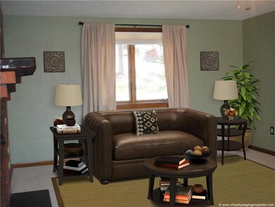 Cozy first floor family room with fireplace and ac
