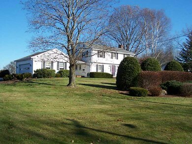 Exterior Front. House sets above and...