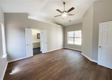 This spacious master bedroom offers the perfect bl