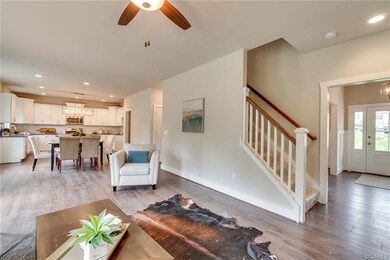 Great Room has Wood-Look Laminate Floors & Fan/Lig
