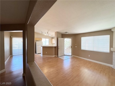 Unfurnished living room with light wood-type floor