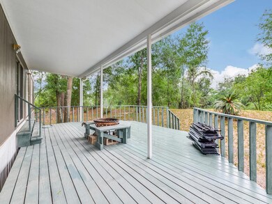 Sit back & relax on your covered front deck!