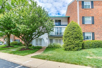 View from the side....Unit 21 is the white building in the middle on the top floor with the awning!