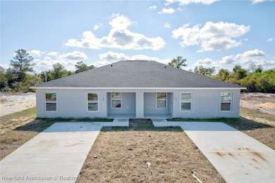 295 Lincoln Rd NE, Lake Placid, FL 33852 - photo 2