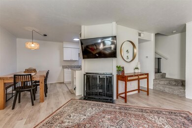 A nice size fireplace in the family room.