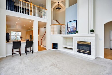 Family room with soaring  vaulted ceilings