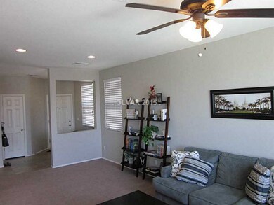 Property Photo. Family Room with Ceiling Fan & Liv