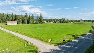 View of property's entrance with a view of countryside
