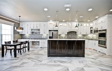 Amazing kitchen!!! Extra cabinets to the ceiling,