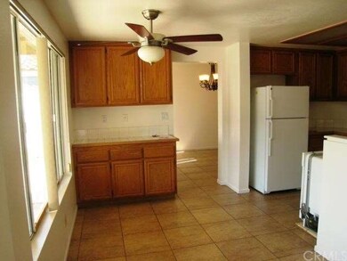 Breakfast nook with ceiling fan.