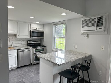 Kitchen island, window and in wall ac