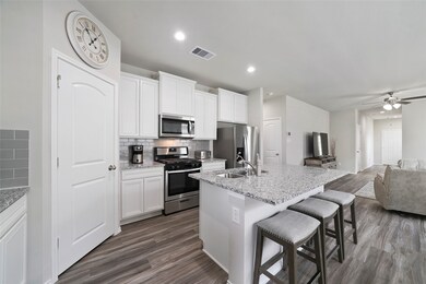 Huge corner pantry. Gas burners.