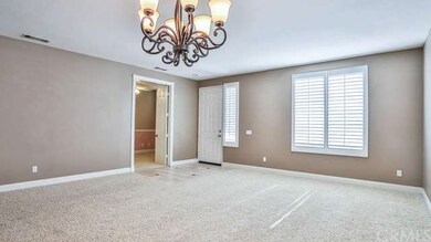 Large living room with tiled entry