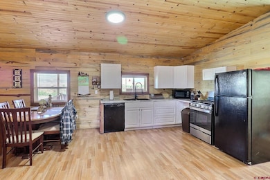 The kitchen portion of the Great Room, full of new and modern appliances and convenient for kitchen to table