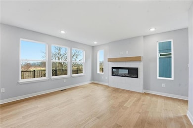 706 Glenn Cir, Raymore, MO 64083 - photo 2