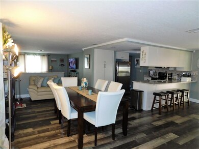 L-shape Dining/family view toward living room & Ki