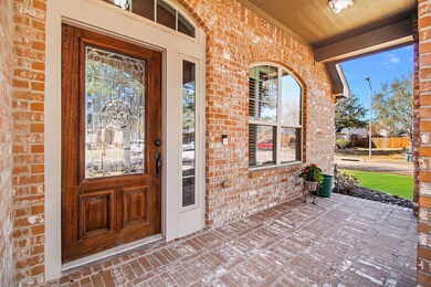 Inviting Front Porch is all brick and is roomy for a wonderful outdoor seating area. Notice the already installed Ring Door Bell.