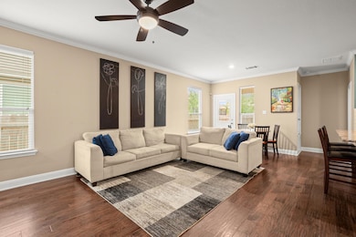 Your living area flows seamlessly into your kitchen and dining area.