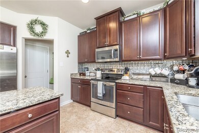 The mudroom is located right off the kitchen and l