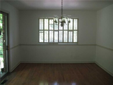 Dining Room. Located at the rear of the home.Door 
