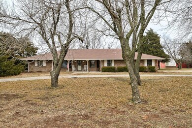Ranch-style home featuring a porch