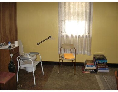 Dining Room. Partial bath (sink and commode) needs
