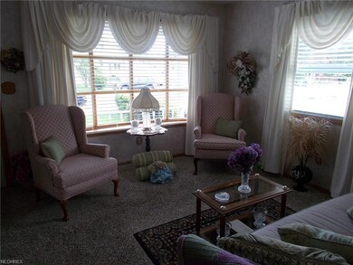 Living room with beautiful bow window.