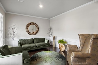 Great room with custom furnishings may also be used as dining room.
