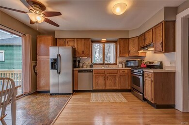 Spacious kitchen with gleaming hardwoods, new appl