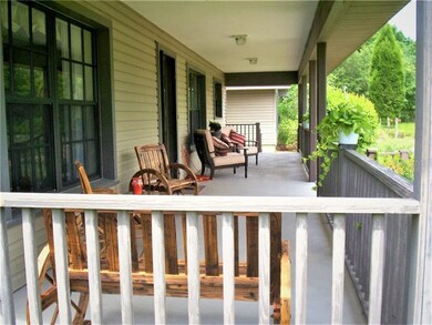 So much room on this beautiful front porch! Bring 