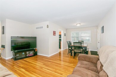 Another view of the living room and dining room, t